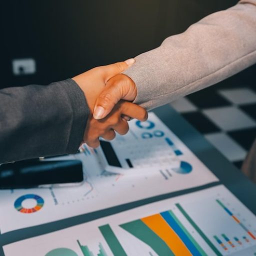 handshake-as-successful-negotiation-ending-closeup-unknown-business-people-shaking-hands-after-contract-signing-modern-office_265022-102675